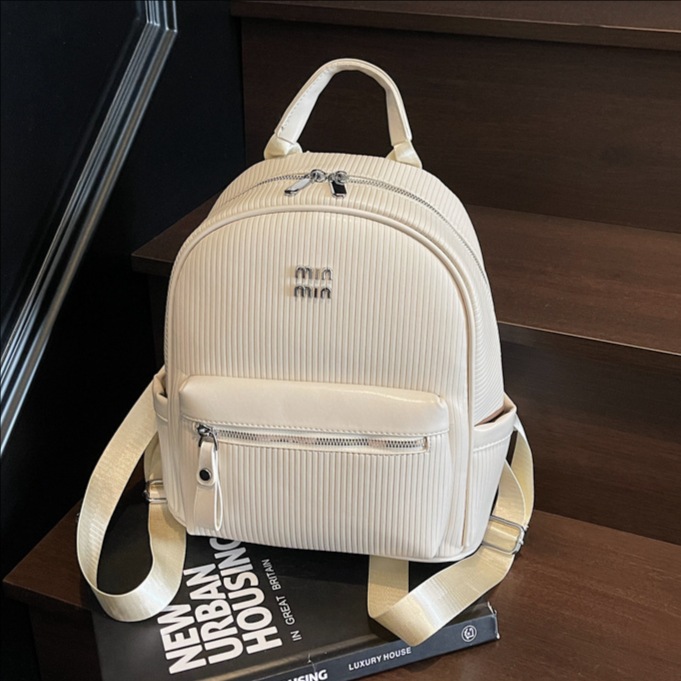 The 2025 new stylish, trendy, casual and fashionable hand-held small backpack is suitable for high school girls. It is versatile and has a large capacity full figure