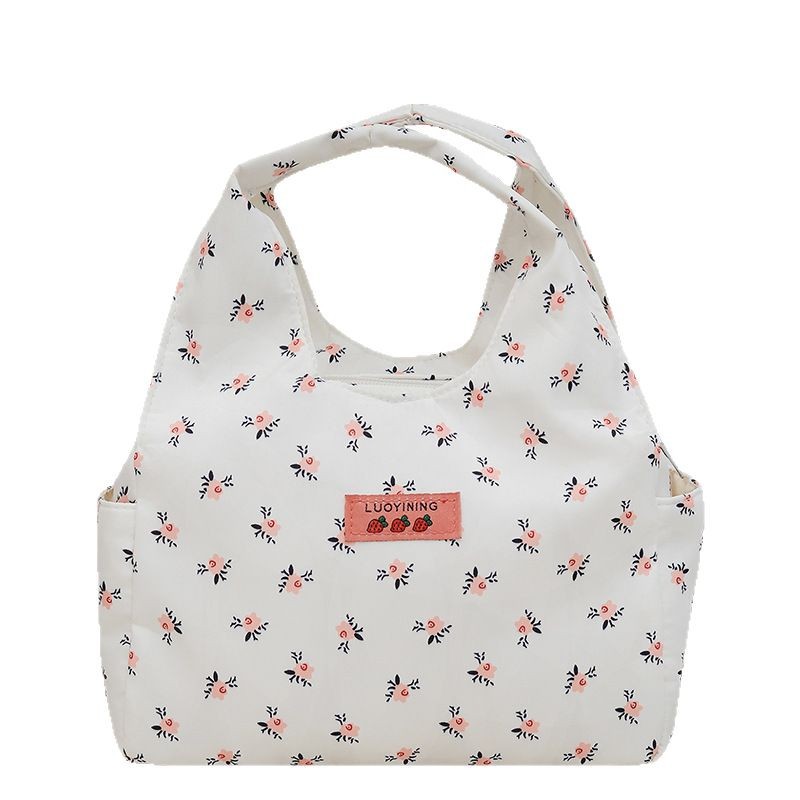 Fresh and delicate floral hand-held canvas bag 2025 new style large-capacity casual women's bag, versatile hand-held tote bag wholesale Item Picture