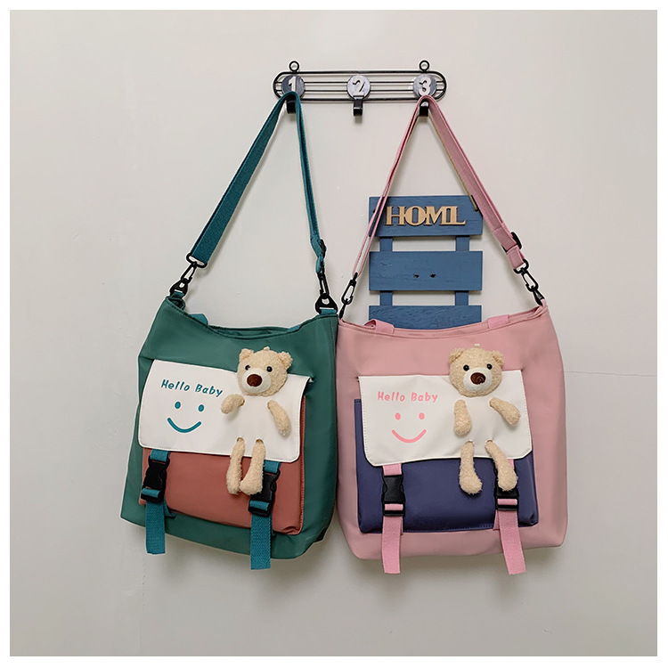 A simple and cute tote bag in Harajuku style, a large-capacity hand-held crossbody bag, a fashionable and casual student bag for class, a single-shoulder bag for girls details Picture