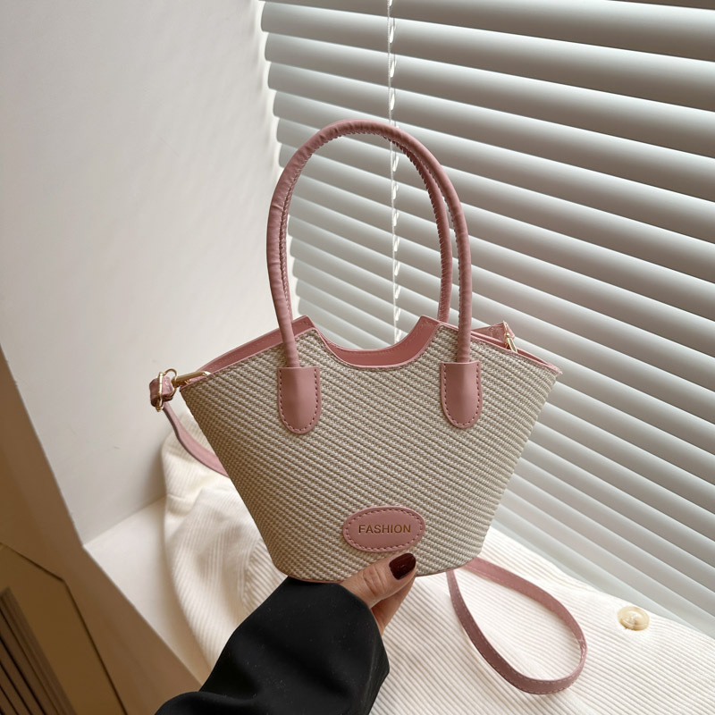 This year, the new hand-held bucket bag for women exudes a unique and elegant vibe. The color-matched crossbody small bag is fashionable and versatile full figure