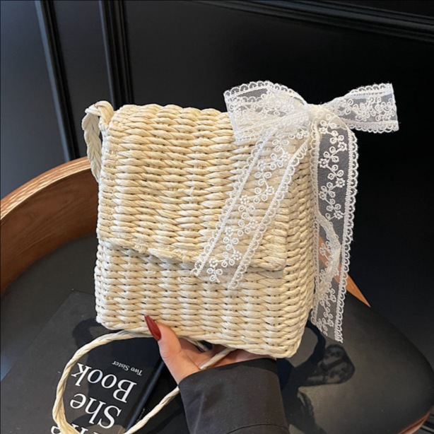 Seaside beach vacation hand-woven bag for women 2025 New style fashionable and stylish lace bow single-shoulder crossbody bag full figure