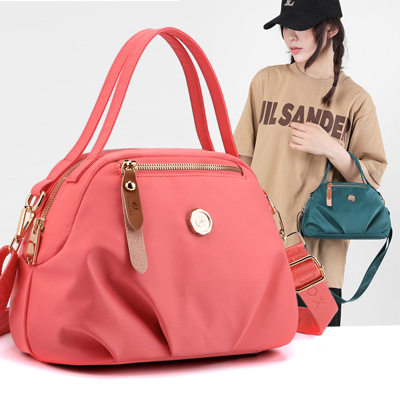 Colorful Fox's new large-capacity fashionable shoulder bag, new casual hand-held dumpling bag for women, and mobile phone bag full figure