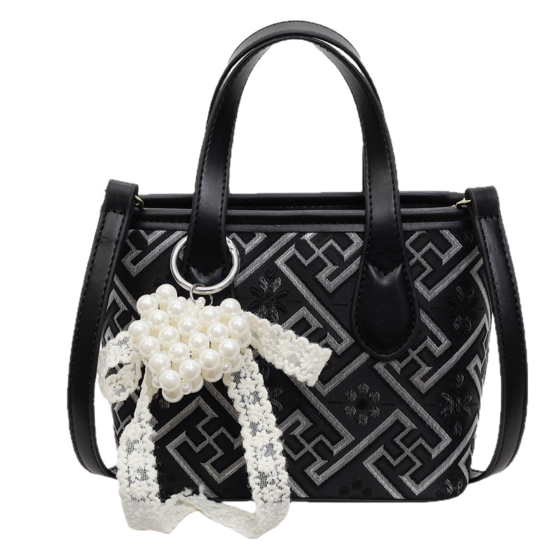 This is a super popular hand-held bucket bag for women in 2025. It is a versatile, trendy and high-end traditional Chinese style single-shoulder crossbody bag Item Picture