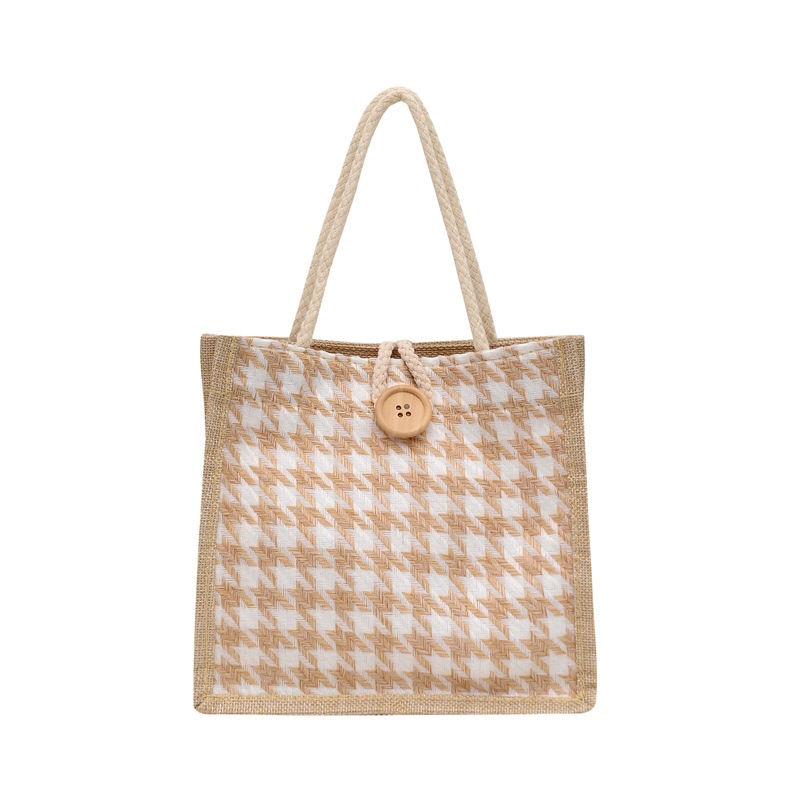2022 New hand-held canvas women's bag, large capacity, fashionable thousand-bird pattern shopping shoulder bag, student class lunch bag Item Picture
