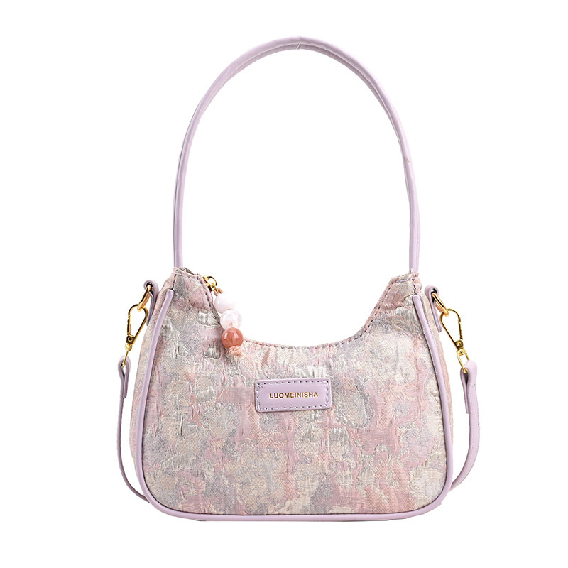 The new 2024 underarm bag for women features a high-end, fashionable and niche design. It's a Korean style versatile single-shoulder crossbody bag for commuting Item Picture