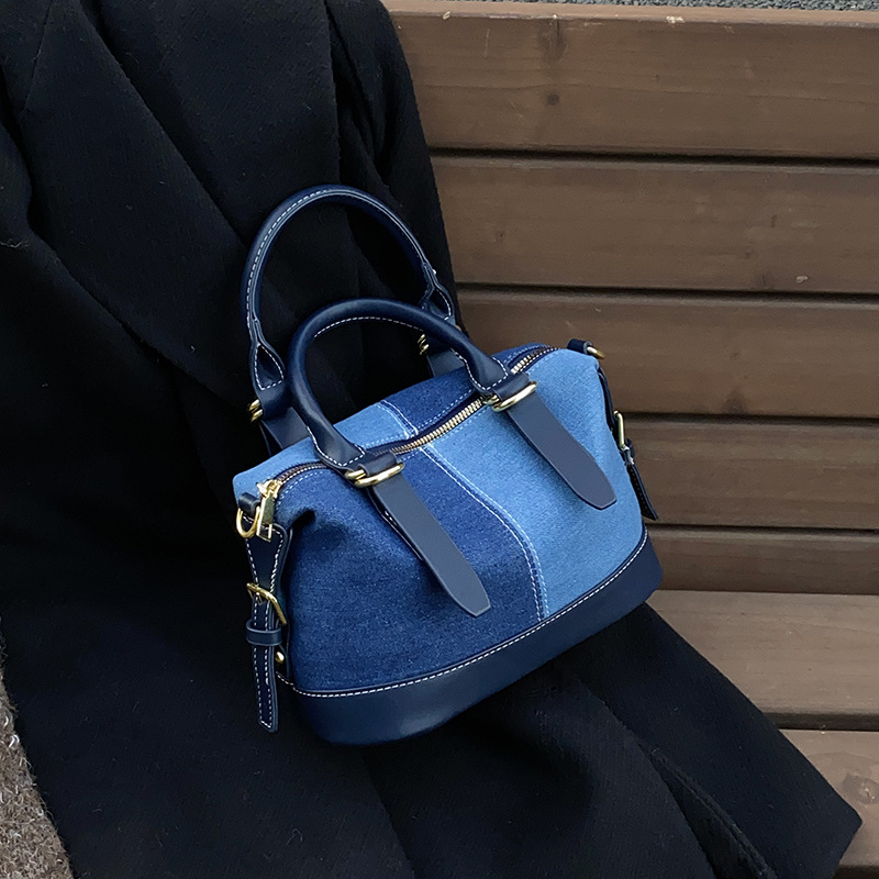 A multi-color denim blue bag for women, a new 2024 fashionable hand-held shoulder bag with a niche design and a casual crossbody bucket bag full figure