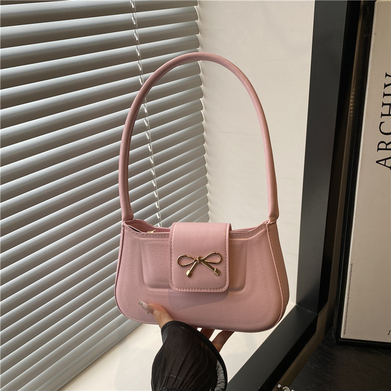 Solid color retro and simple hand-held crescent bag 2025 new style French chic and niche design casual single-shoulder armpit bag full figure