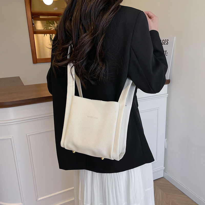High-end ladies' bag 2025 New style fashionable casual crossbody bag for work and commuting, hand-held vegetable basket bucket bag details Picture