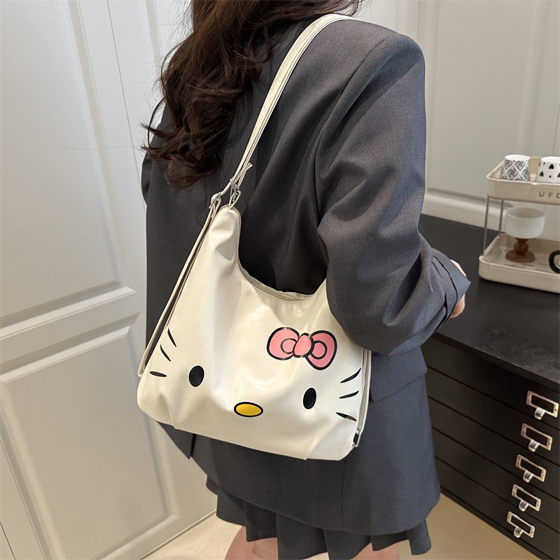 A new casual little cat fashion bag for women, a versatile commuter bag, a student single-shoulder crossbody bag, and a popular women's bag details Picture