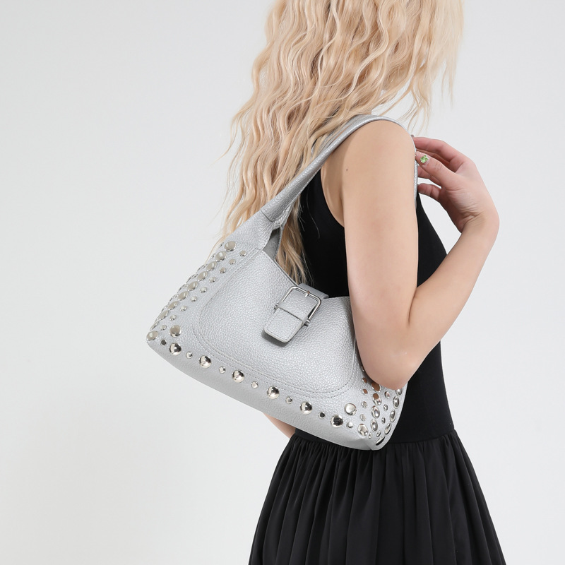 Cross-border retro rivet solid color handbag for women, 2025 new style, high-end texture, simple and large capacity single-shoulder armpit bag details Picture