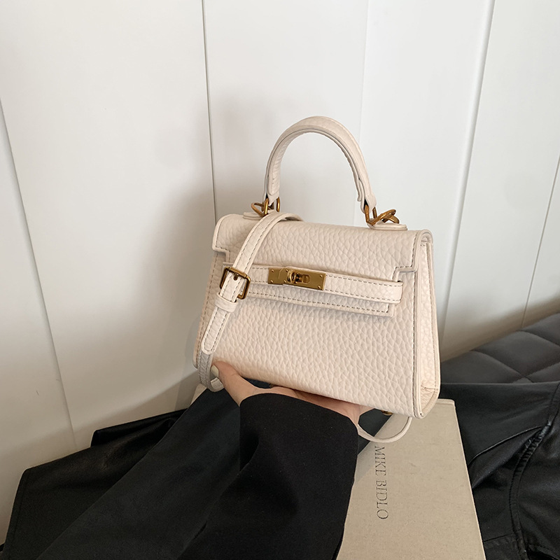 French hand-held Kelly bag, a high-end and versatile crossbody small bag for women, a new 2024 fashionable commuting single-shoulder bag details Picture