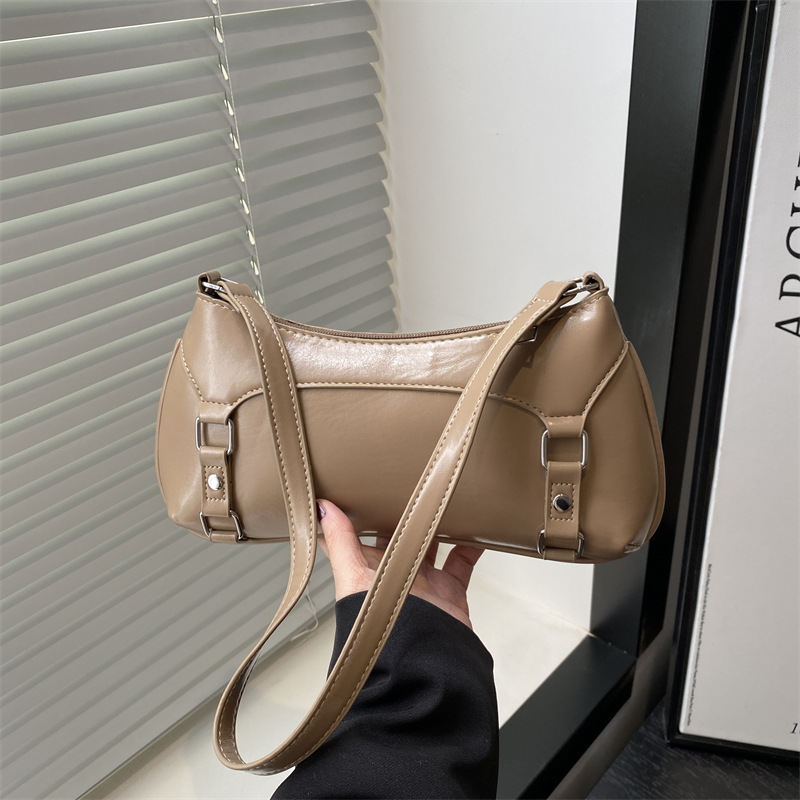 Solid color simple baguette bag for women 2025 new trendy and fashionable niche design single-shoulder bag sweet and casual underarm bag full figure