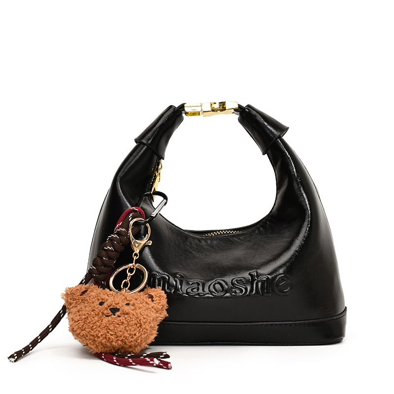Retro and fashionable hand-held pea bag for women, 2024 new simple and casual single-shoulder bag, niche design, high-end women's bag Item Picture