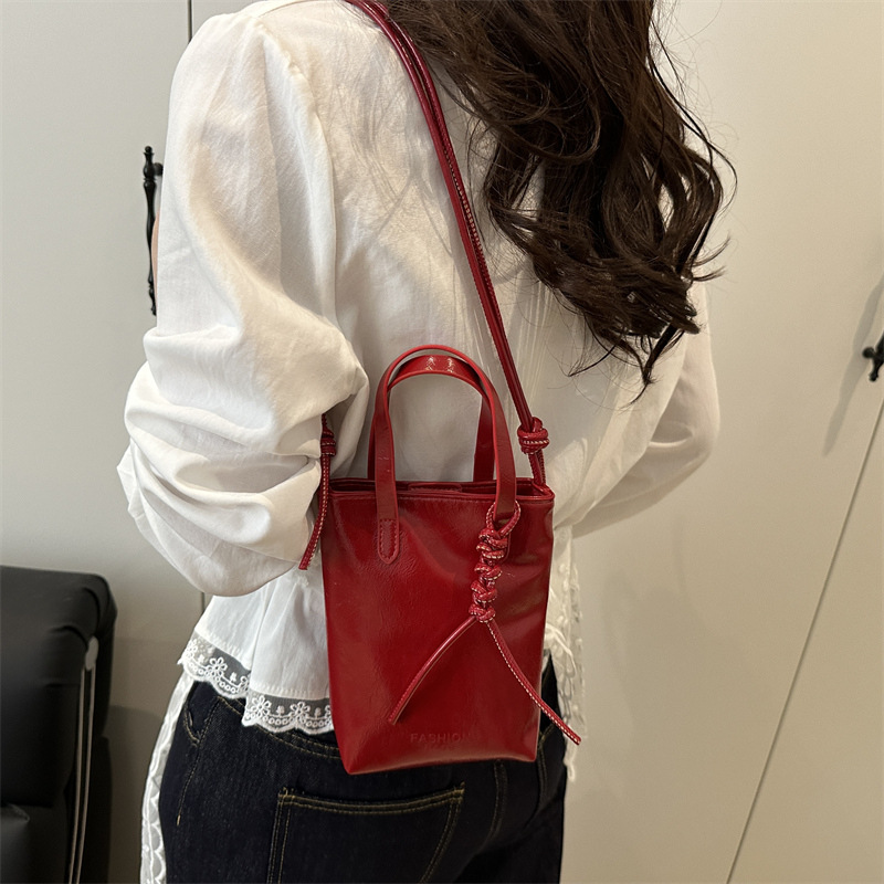 High-end and niche design women's 2025 new versatile hand-held small square bag, a small bag for holding mobile phones in summer details Picture