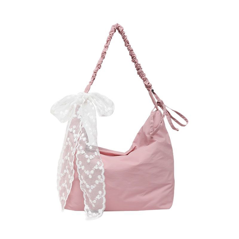 Large-capacity versatile tote bag for women, new spring/Summer 2025 canvas bag for commuting, simple solid color single-shoulder crossbody bag Item Picture