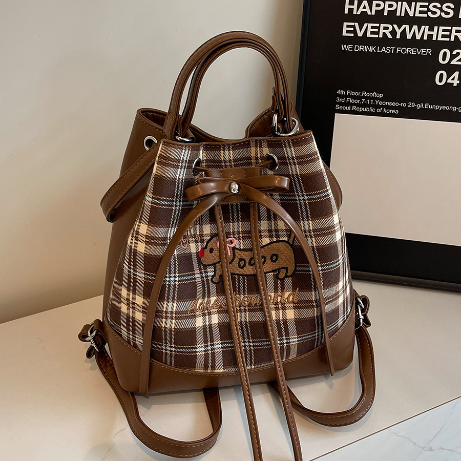 The checked Dachshund bag is a new 2024 trendy school-style backpack for women, featuring a large capacity and a single shoulder bucket full figure