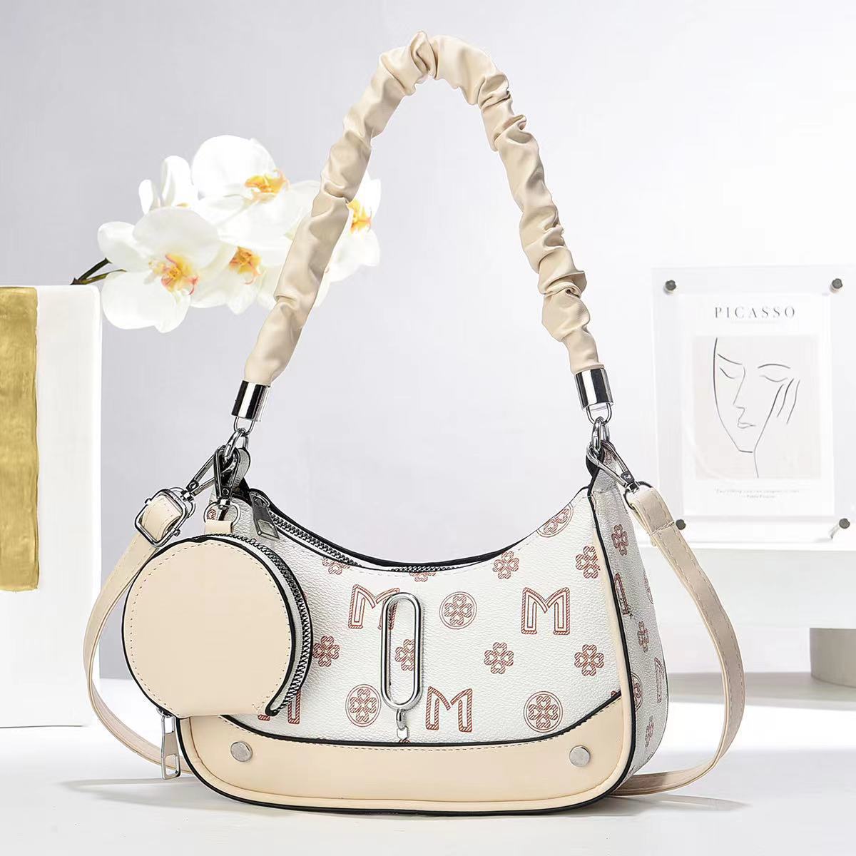 New large-capacity, fashionable and versatile underarm women's bag with printed text, single-shoulder hand-carry, stylish women's bag, crescent-shaped small bag full figure