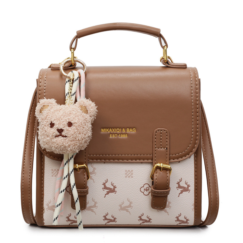 2025 New fashionable and versatile handbag, women's large-capacity single-shoulder bag, niche crossbody bag, printed trendy backpack Item Picture