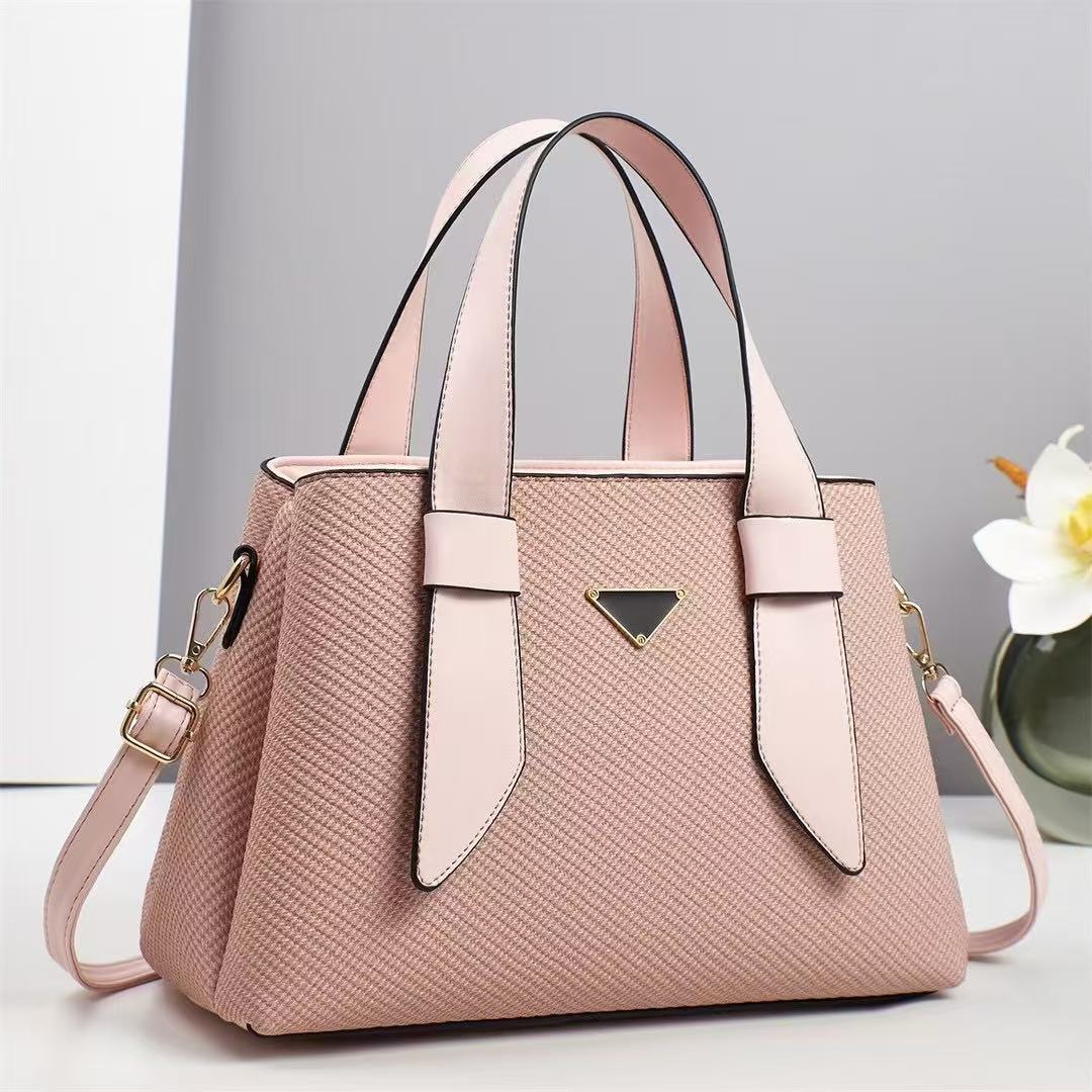 A new 2025 trendy solid color Korean-style, stylish and individualistic, versatile, fresh and clean hand-held shoulder crossbody trendy women's bag details Picture
