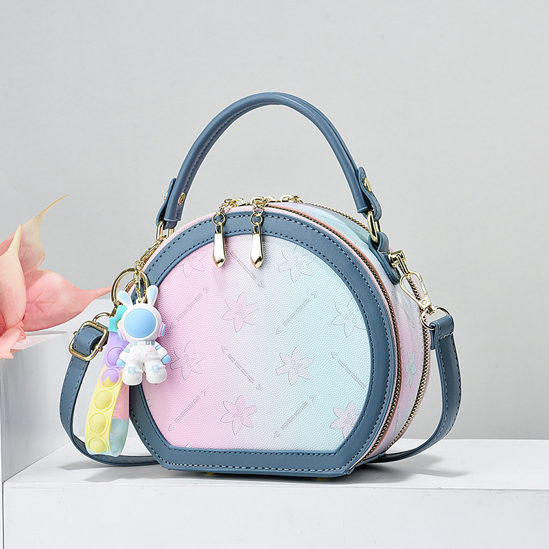 Rainbow-colored small round bag 2023 new versatile and fashionable handbag, single-shoulder manufacturer, elegant crossbody bag for foreign trade ladies Application Scenario