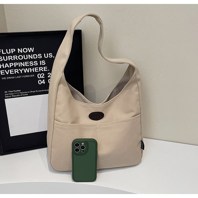 New large-capacity simple canvas bags, single-shoulder underarm bags for students' classes, niche fashion and versatile tote bags wholesale Application Scenario