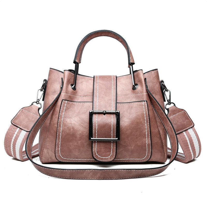 The manufacturer's best-selling 2021 new fashionable oil-leather pliers bag, iron handle thick wire bag, versatile European and American women's bag for export wholesale Specification drawing