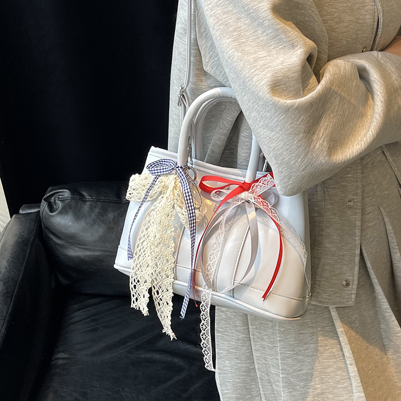 High-end and simple Korean-style hand-held bucket bag for women, 2025 new casual lace commuting fashion single-shoulder crossbody bag details Picture