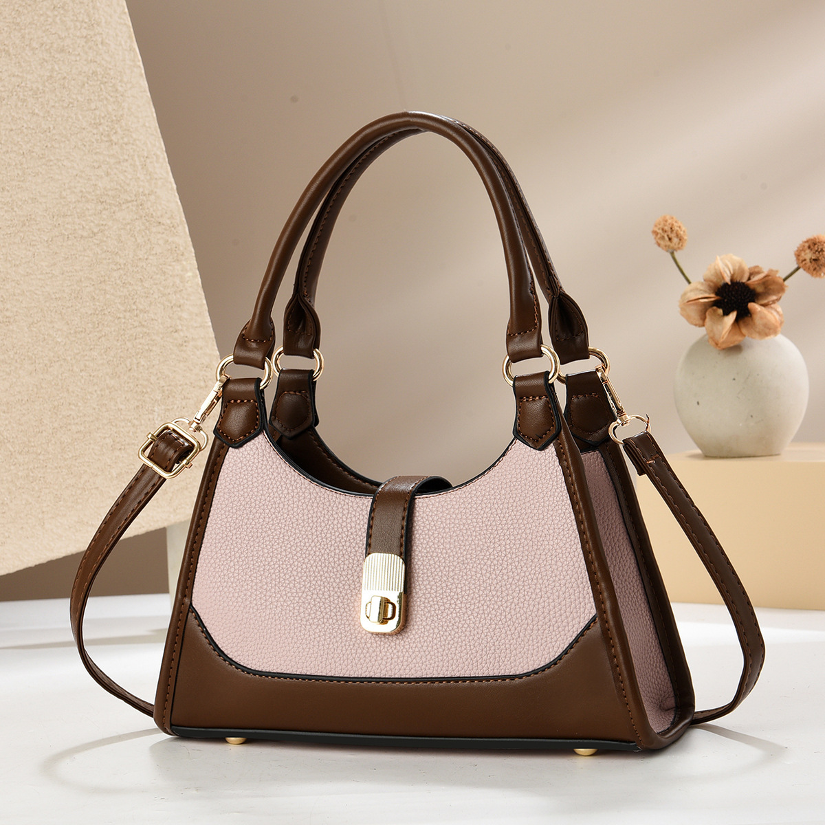 A new Korean-style women's bag with a high-quality texture, a fashionable lock buckle single-shoulder hand-carry bag, and a trendy and stylish baguette bag Application Scenario
