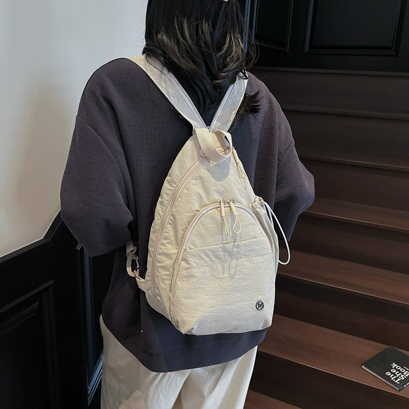 2025 New niche lightweight nylon fabric backpack, stylish ladies' travel small backpack, casual and personalized commuting bag details Picture