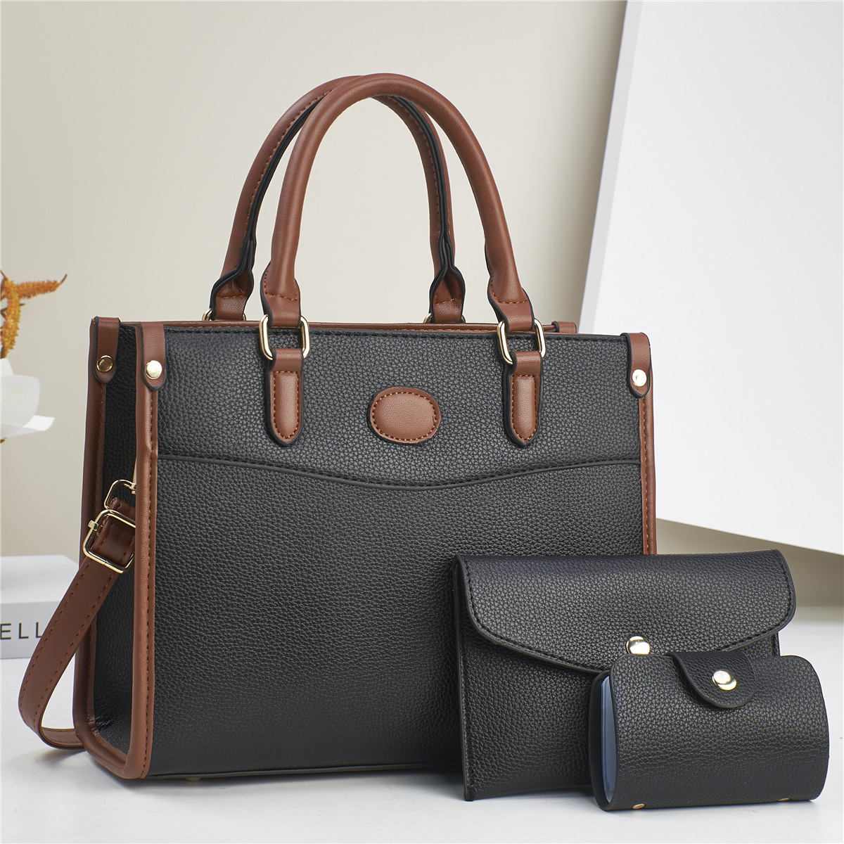 The new women's bag is a simple and elegant commuter style tote bag, a three-piece set of women's bags with a high-end feel, and a hand-held shoulder bag full figure