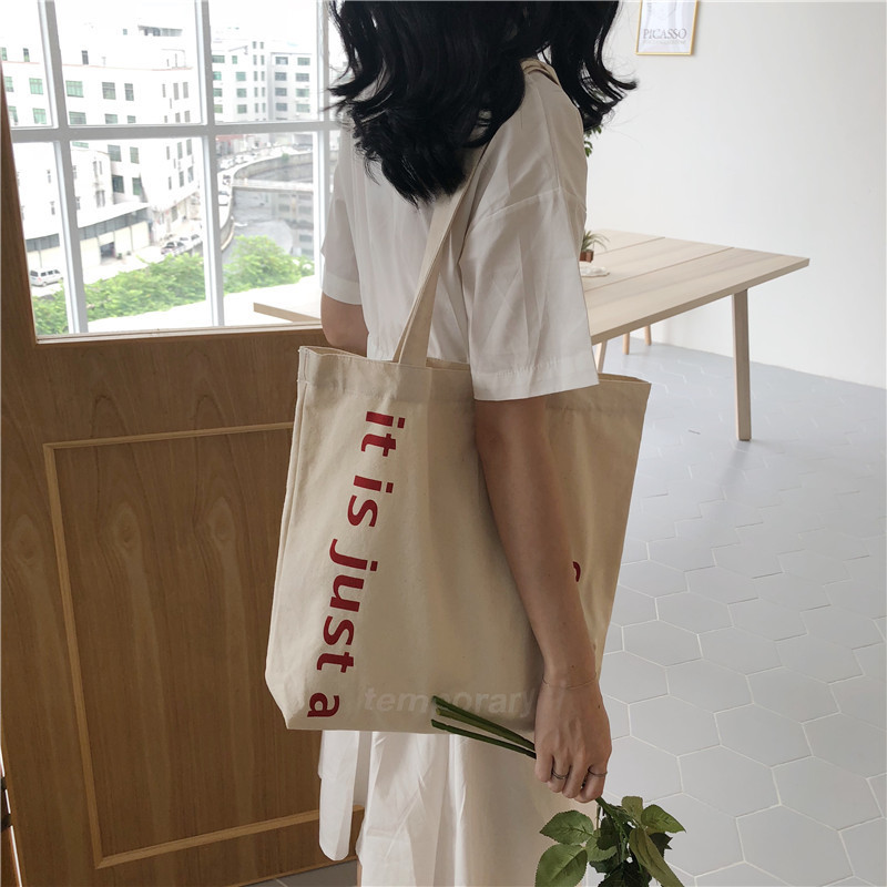 E115 Korean large-capacity single-shoulder bag ulzzang Harajuku simple student canvas bag hand-held shopping bag large bag details Picture
