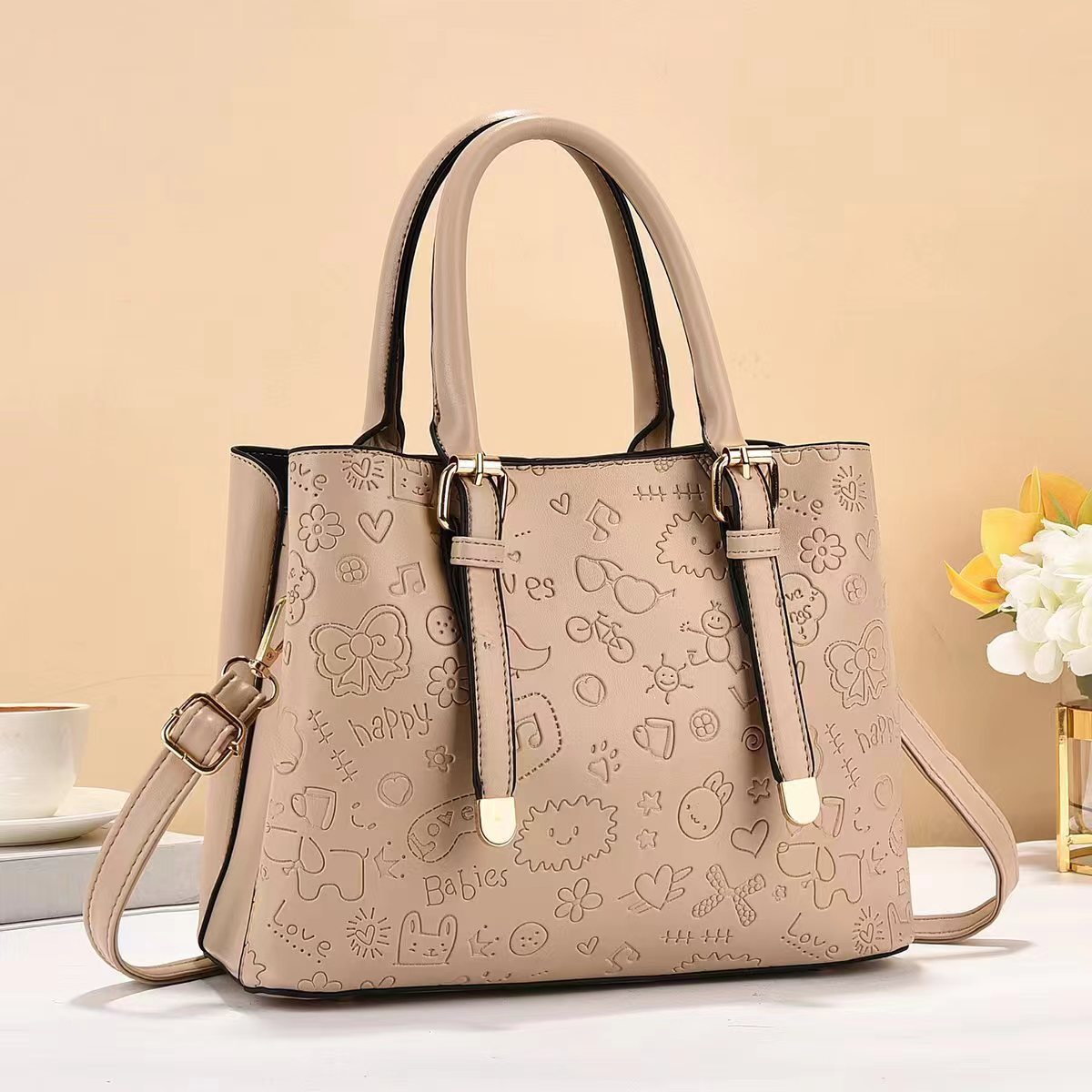 The manufacturer's export bag for women, 2024 new embossed graffiti handbag, Korean-style texture, single-shoulder crossbody bag, fashionable for women details Picture