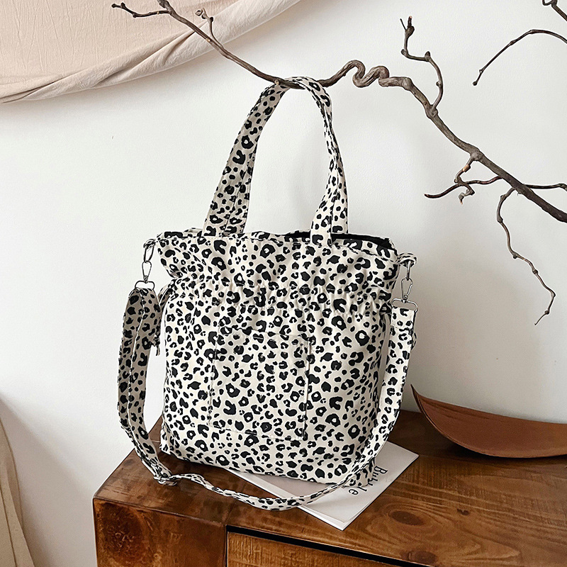 2024 Autumn/Winter new Korean-style fashionable canvas bag, single-shoulder bag, leopard print large capacity, laid-back style fabric bag, women's drawstring bag full figure