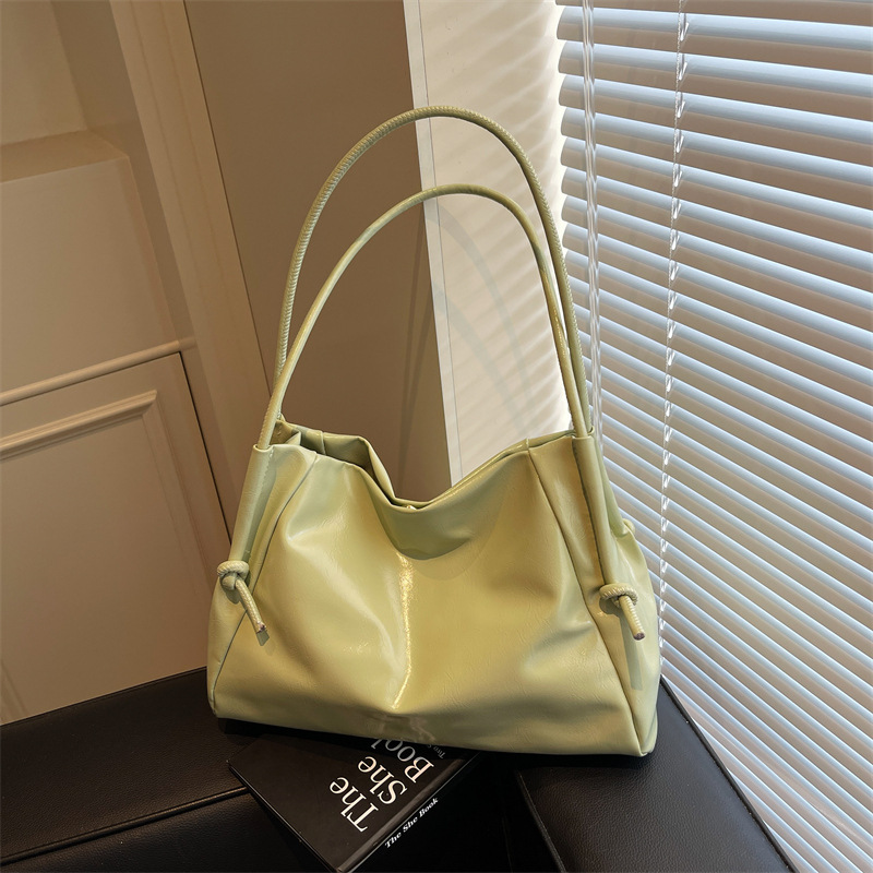 Letter indentation 2025 Spring/Summer New crossbody trendy bag, single-shoulder hand-carry large capacity casual underarm women's bag full figure