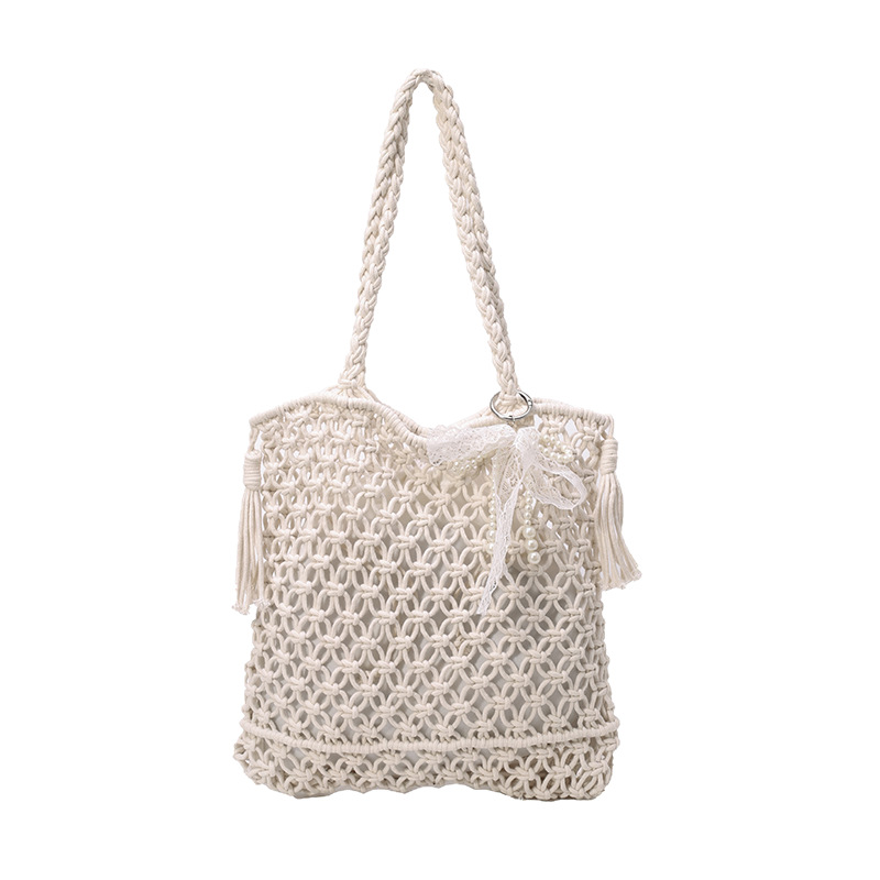 New summer 2025 seaside and beach niche design bucket bag for women, large-capacity vacation, hollowed-out straw woven single-shoulder bag Item Picture