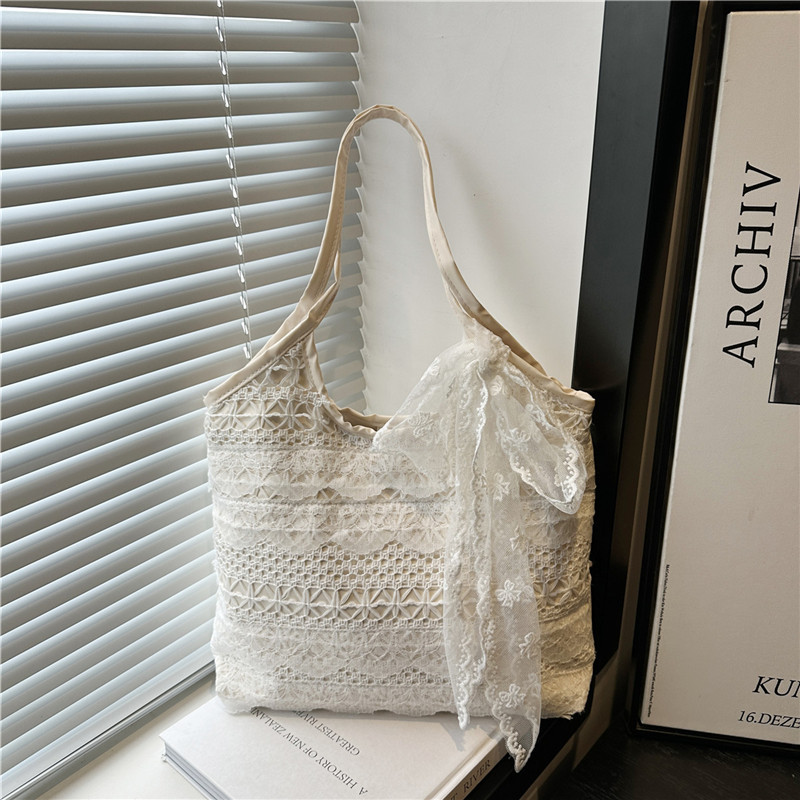 Korean niche gentle style casual vacation lace woven bag for women 2025 new high appearance level fairy-like beach bag full figure