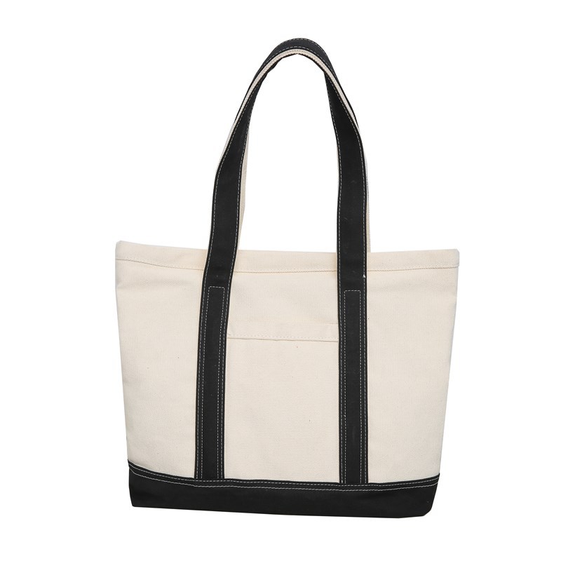 A new trendy and versatile canvas bag for women, a casual tote bag for work and commuting Item Picture