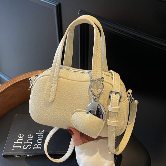 2025 New style lychee pattern fashionable and versatile hand-held pillow bag for women, stylish, casual and simple, versatile single-shoulder crossbody bag full figure