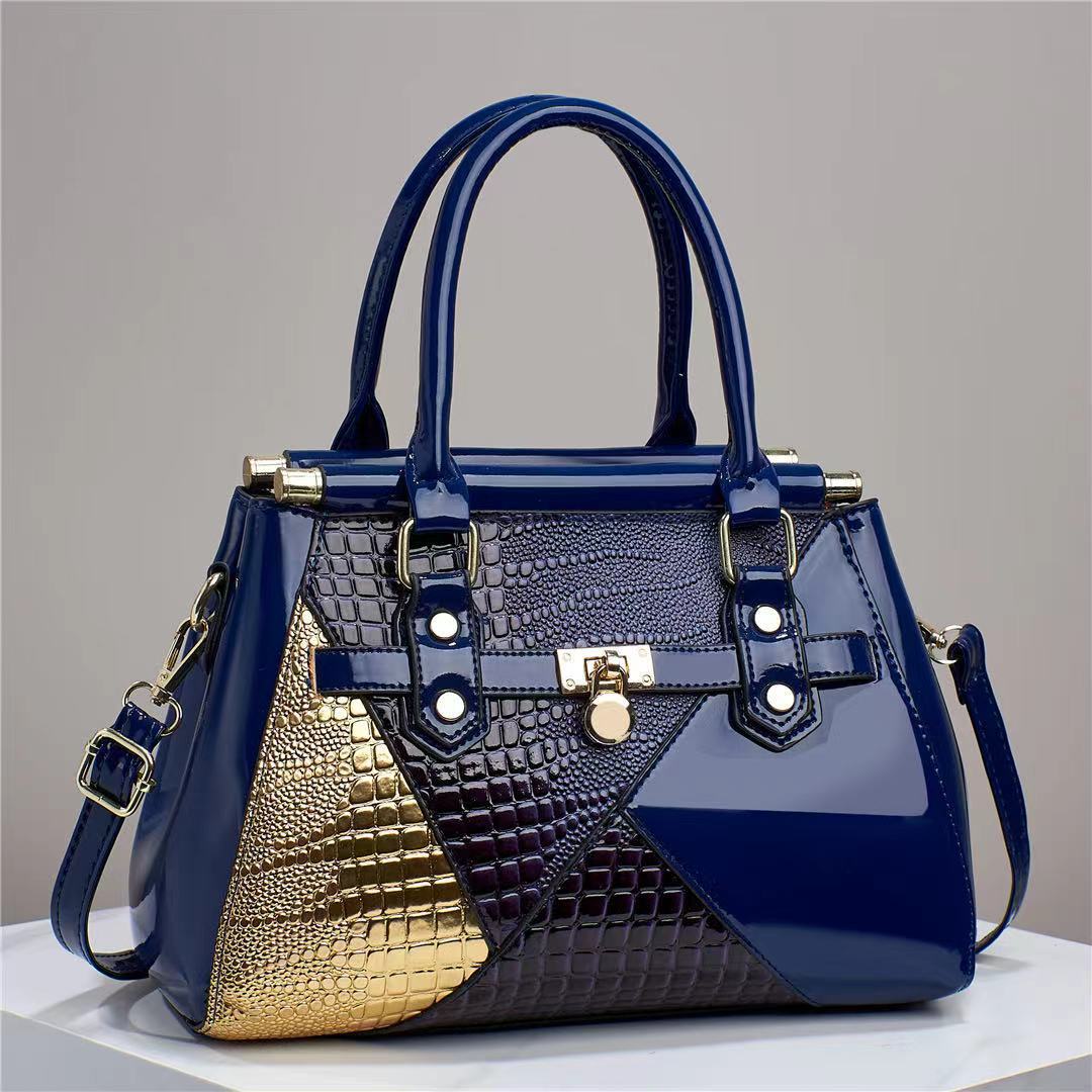 The manufacturer's 2023 new style of patchwork crossbody bag for foreign trade women is a versatile mom bag and a fashionable hand-held shiny leather single-shoulder bag full figure