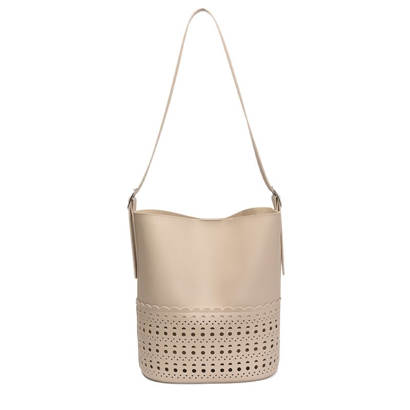 Hollowed-out solid color fashionable large-capacity bucket bag for women 2025 new style, stylish, versatile, casual and simple single-shoulder crossbody bag Item Picture