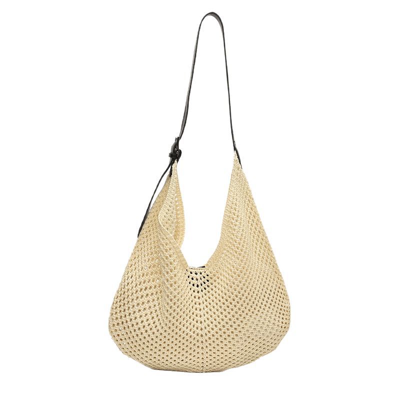 High-end soft surface hollowed-out knitted large-capacity underarm bag for women, 2025 new style, versatile and fashionable solid color single-shoulder bag Item Picture