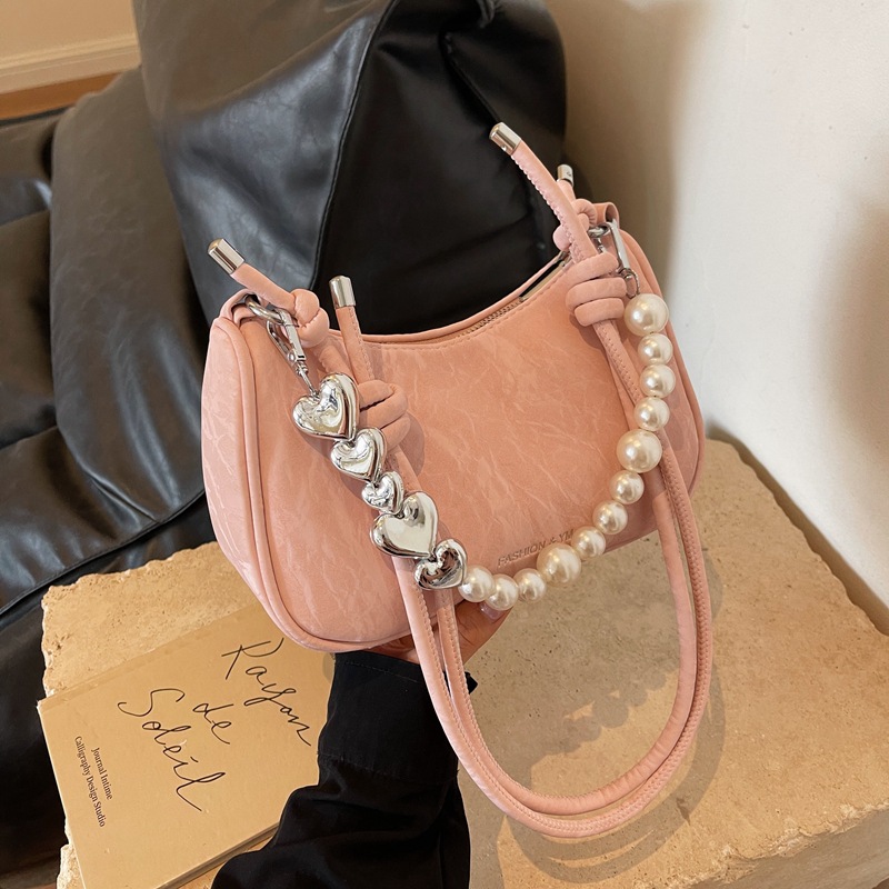 The new underarm bag for women in 2025 features a fashionable and niche design. This year, a solid-colored pearl versatile single-shoulder crossbody bag is in fashion Specification drawing