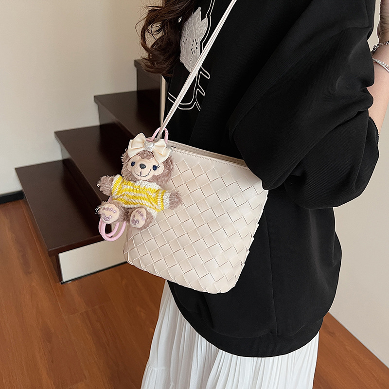 The 2025 new high-end woven mini bucket bag is a simple and stylish single-shoulder crossbody bag for women's fashion in solid color details Picture