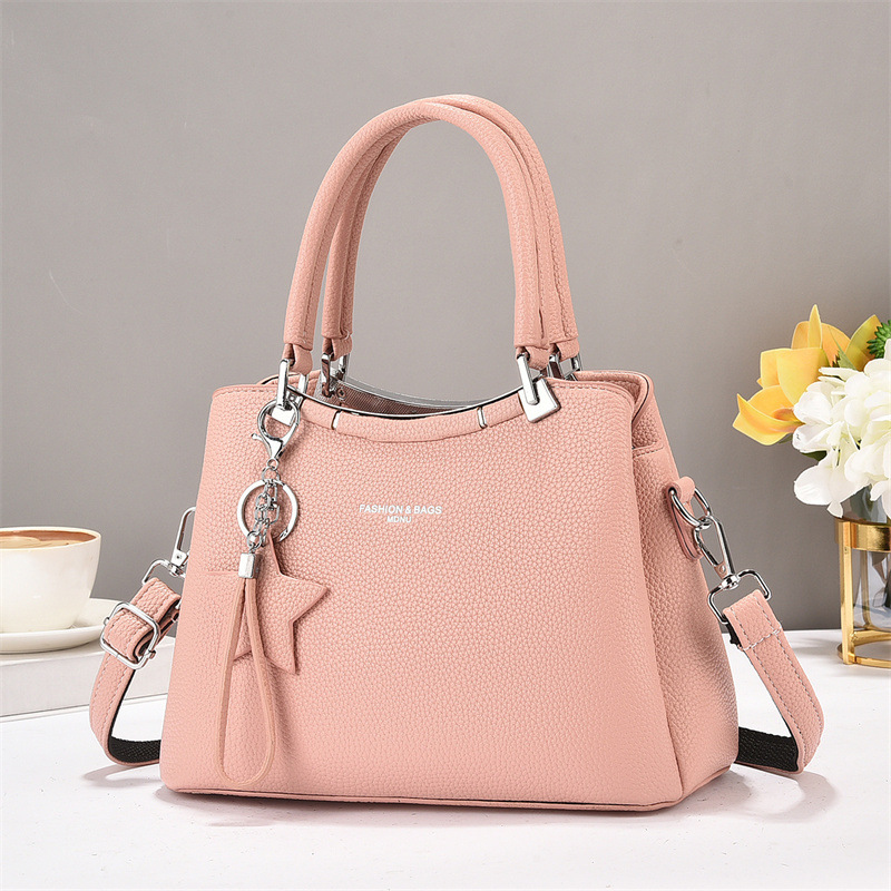 The new 2025 women's bag is a fashionable and versatile commuter tote handbag with a shoulder and crossbody. Women's tote bags are a trend in women's bags details Picture