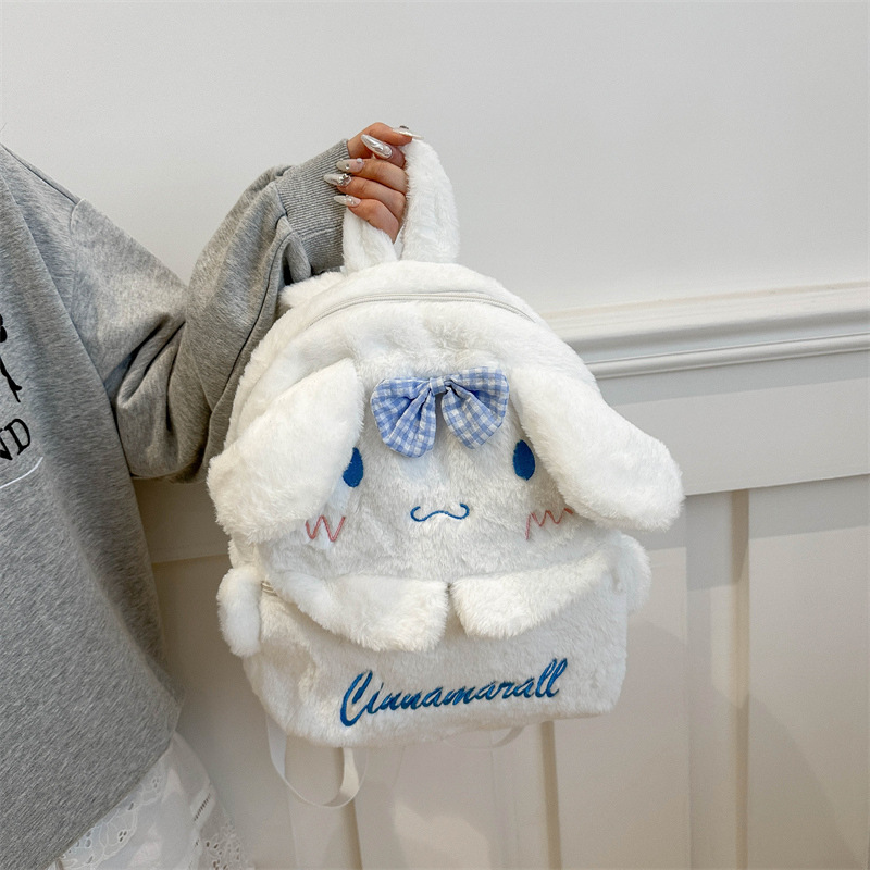 This new cartoon casual school backpack can hold A4 paper and has a large capacity. It is a cute travel storage bag for girls details Picture
