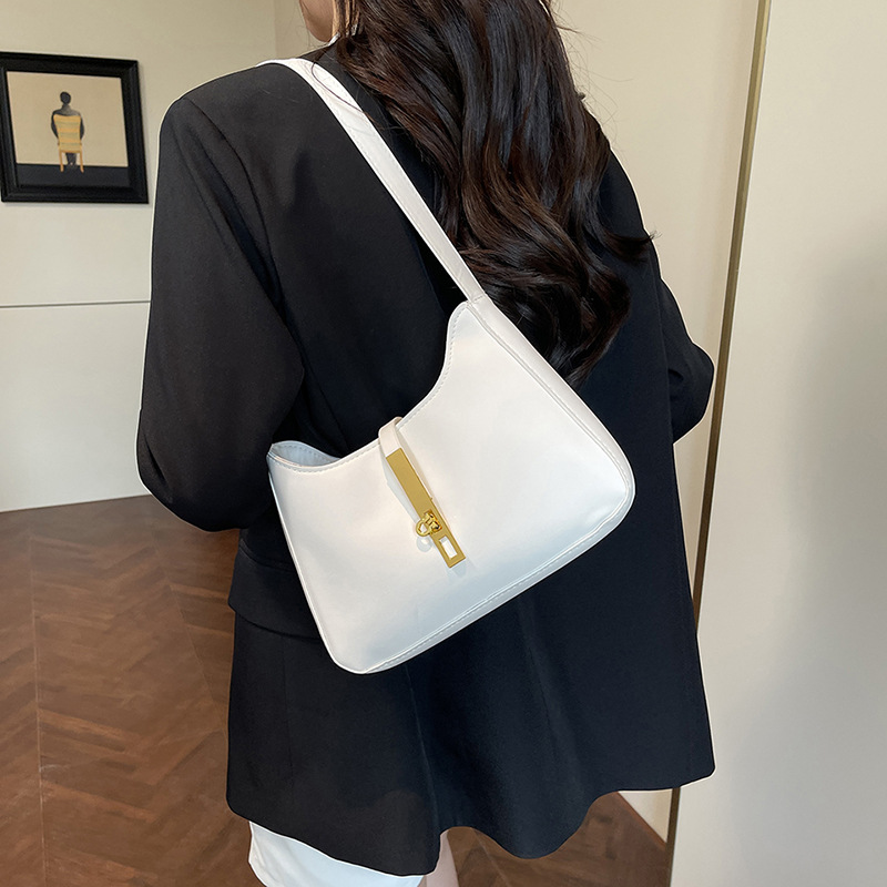 Korean color-blocking design women's 2025 summer new style, elegant and fashionable texture, large capacity, simple hand-held armpit bag details Picture