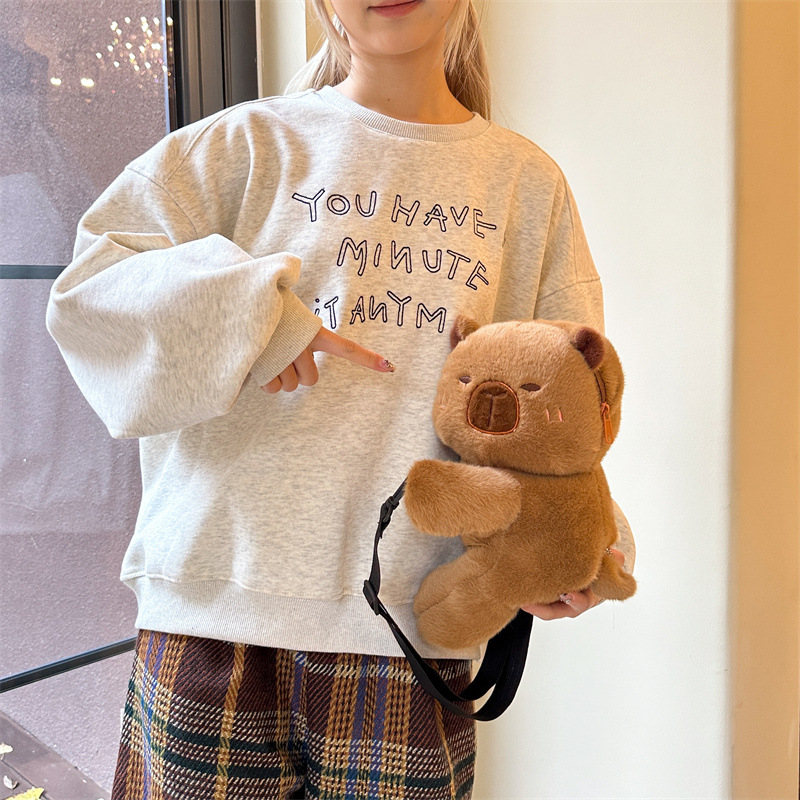 New plush and cute capybara crossbody bag, high appearance level, sloth piglet single-shoulder bag, student commuting backpack, and doll bag details Picture