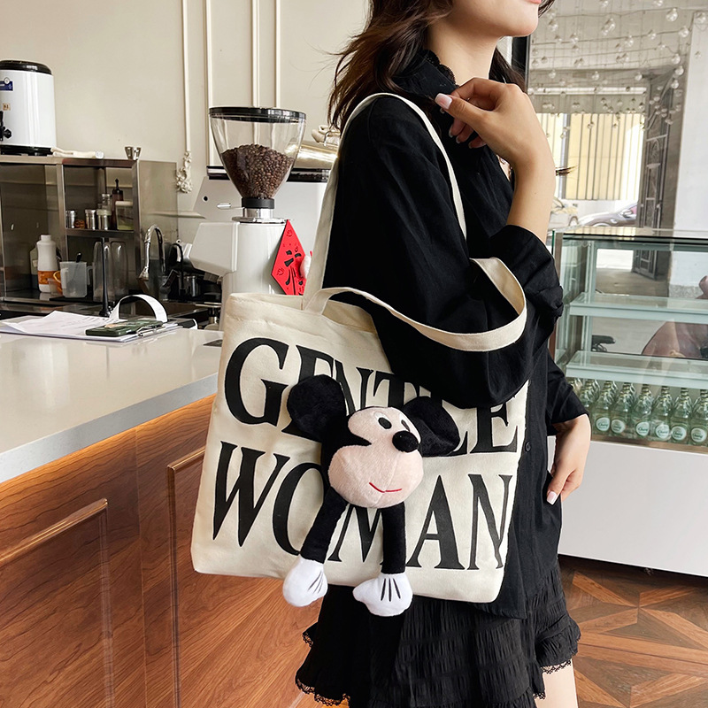Canvas bag, doll, letter print, large-capacity single-shoulder tote bag, 2025 Spring new commuter bag Specification drawing