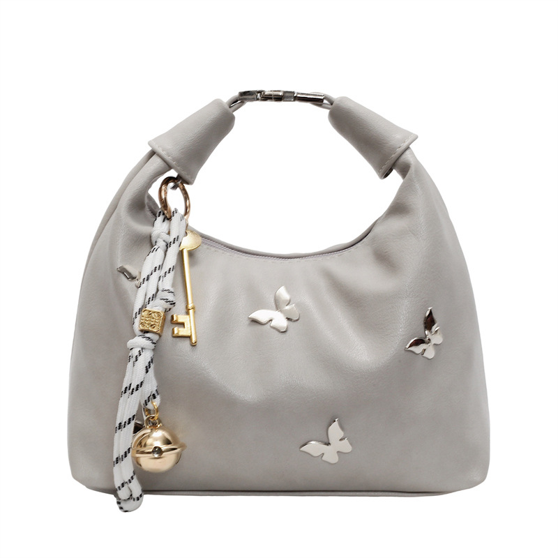 A high-end and niche design bag for women 2025, a new fashionable single-shoulder crossbody bag, simple and casual hand-held dumpling bag Item Picture
