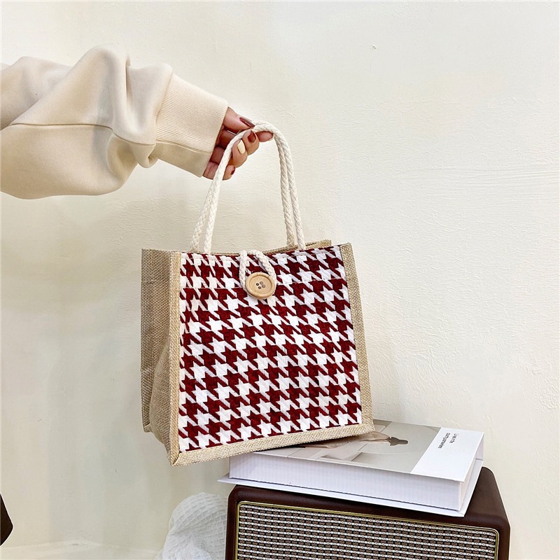 2022 New hand-held canvas women's bag, large capacity, fashionable thousand-bird pattern shopping shoulder bag, student class lunch bag full figure